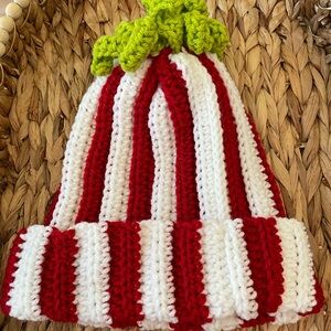 CROCHET HANDMADE GRINCH inspired Red/White beanie with green tassel. CHRISTMAS